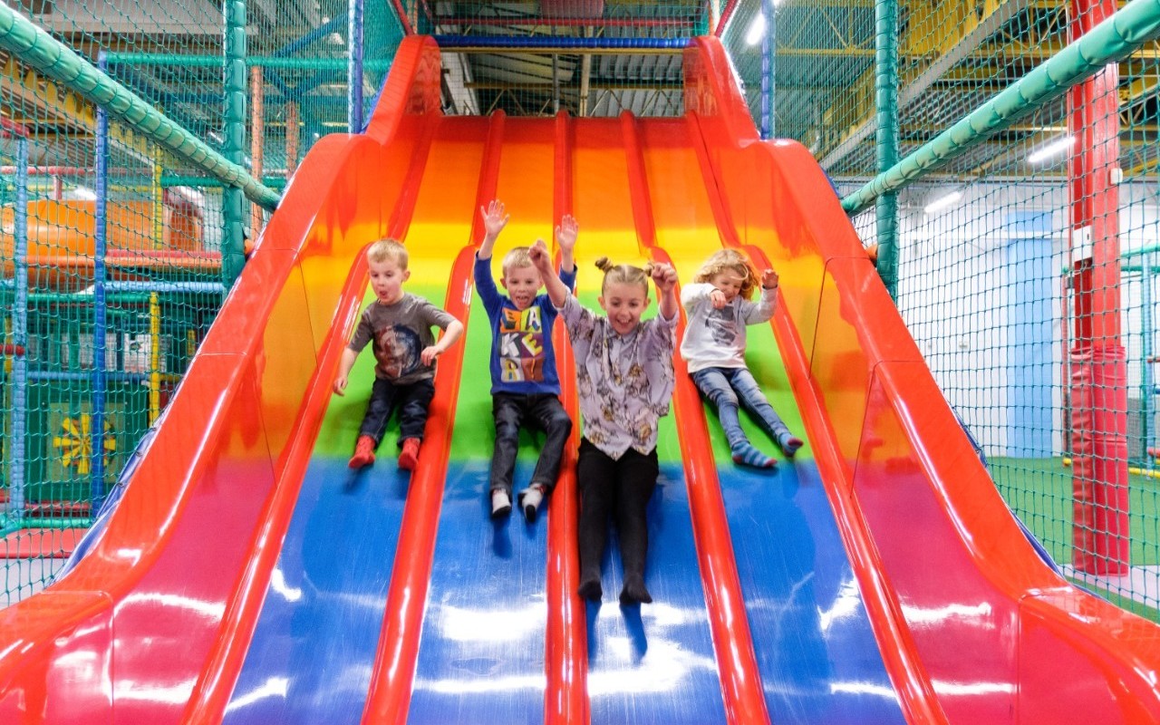 Children on slide at Berzerk